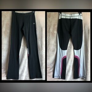Rare Vintage Lululemon flare pants in black whiter and pink. Size 8 tall